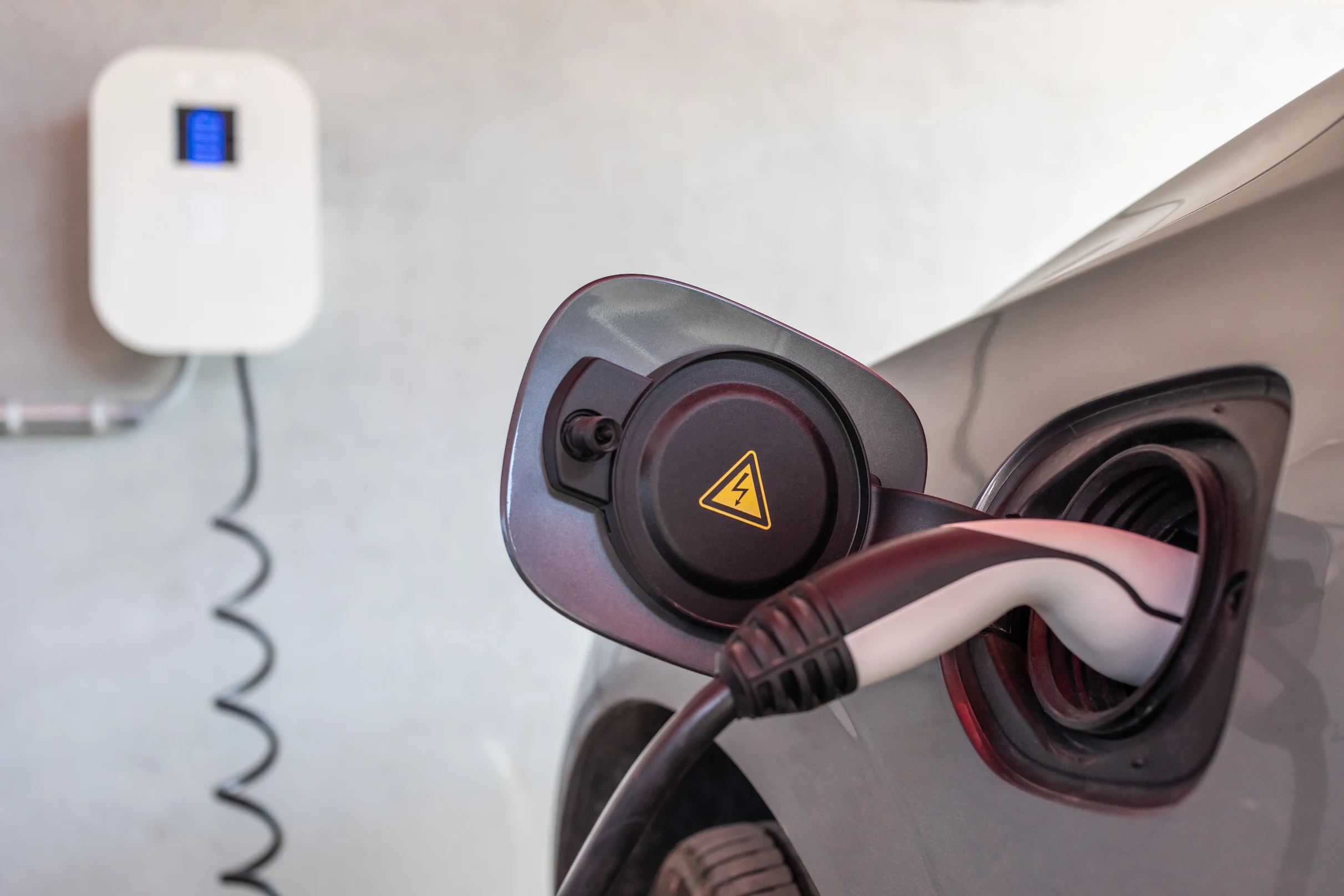 Electric vehicle charging at home with professional EV charger installation